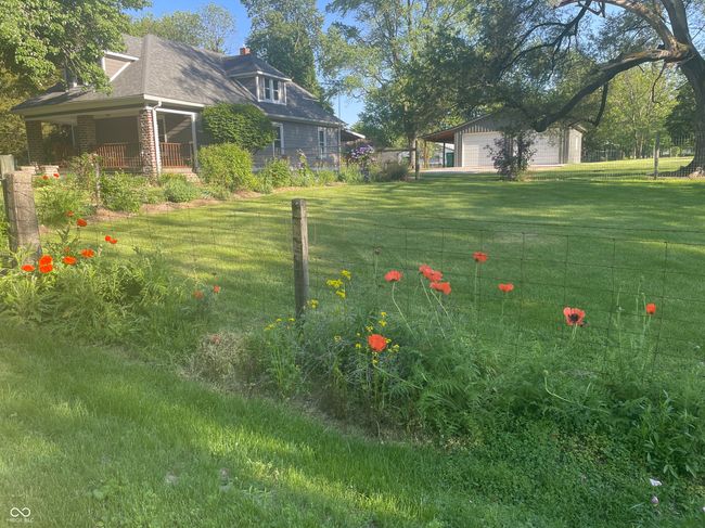 view of green lawn from the street | Image 30