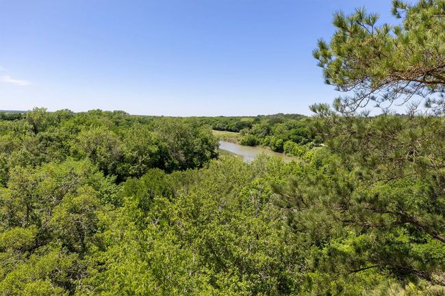 View of nature featuring a water view and a forest view | Image 22
