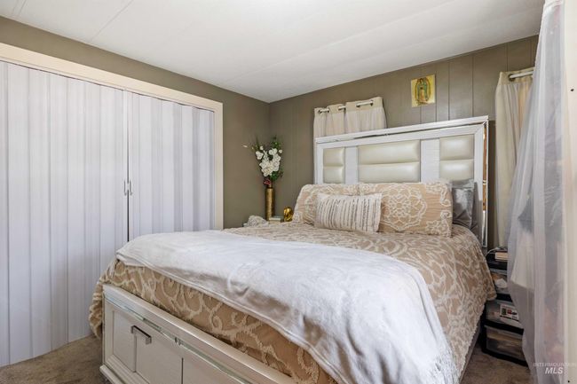View of carpeted bedroom | Image 11