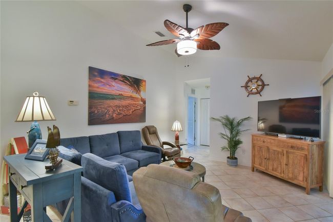 Tiled Family Room with view of the Guest Bedroom | Image 10