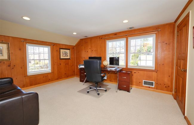 Office with a wealth of natural light, visible vents, and carpet flooring | Image 25