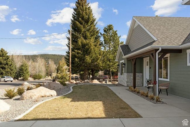 View of yard featuring a porch | Image 43