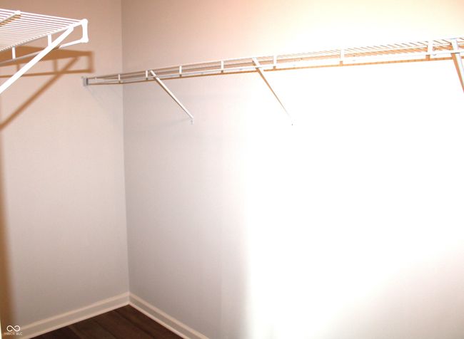 Primary Bedroom walk-in closet | Image 12