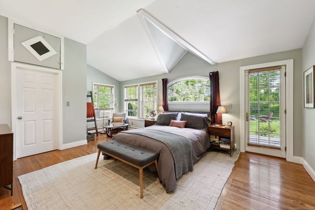 First floor, walk-in closet, access to rear deck and sitting area. | Image 12