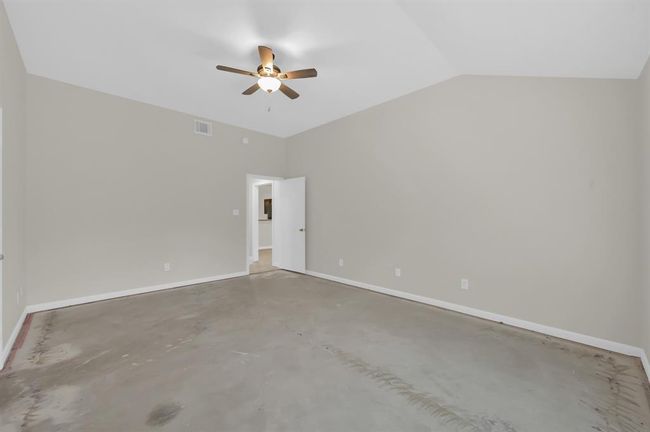 Primary Bedroom. Dining area through the door and to the right. | Image 25