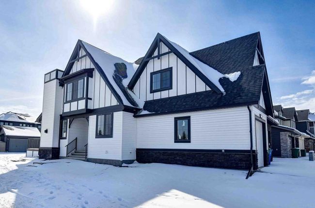 1209 Coopers Drive Sw, Home with 4 bedrooms, 2 bathrooms and 3 parking in Airdrie AB | Image 2