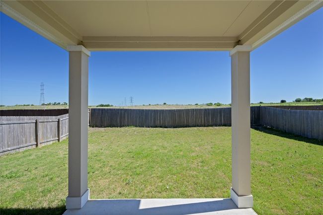 View of yard with a fenced backyard | Image 33