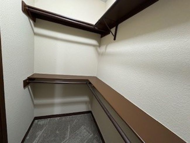 Walk in closet with carpet flooring | Image 22