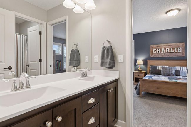 Jack and Jill full bath with dual vanity and seperate bath area. | Image 24