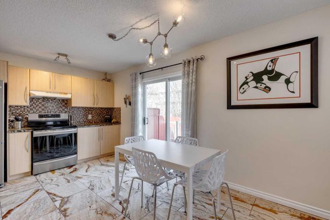 44 Bridlewood Gardens Sw, Home with 4 bedrooms, 2 bathrooms and 4 parking in Calgary AB | Image 7