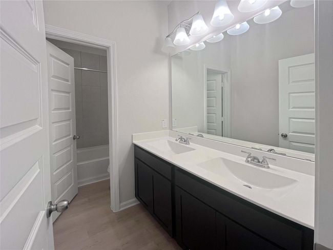 Secondary Bathroom with Dual Sinks. Home under construction. Sample floor plan photo used for illustrative purposes only. Upgrades, selections options, windows and colors may vary. | Image 13