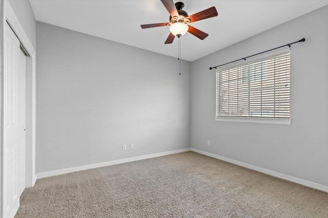The second and third secondary rooms sit on the opposite side of the home. | Image 25