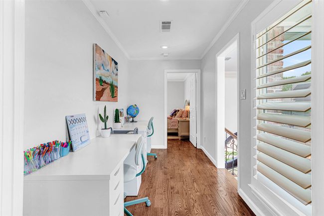 The loft area at the top of the stairs is the perfect place for a study area for kids, or perhaps a row of bookcases to create a quiet reading nook. | Image 14