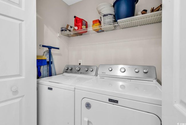 Clothes washing area with washing machine and dryer and laundry area | Image 14