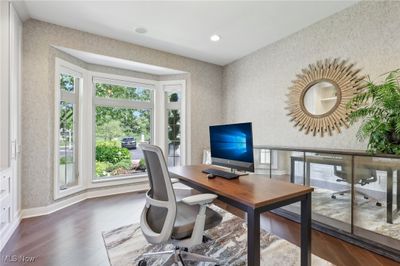 Office/dining space with dark wood flooring | Image 3