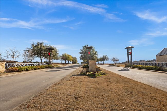 View of road featuring street lights | Image 6