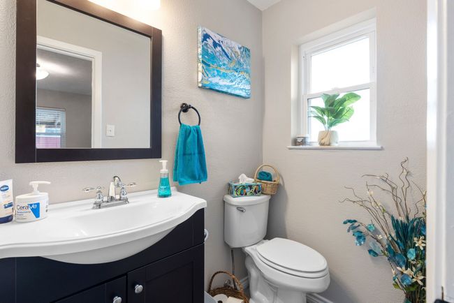 Half bath featuring vanity and toilet | Image 34