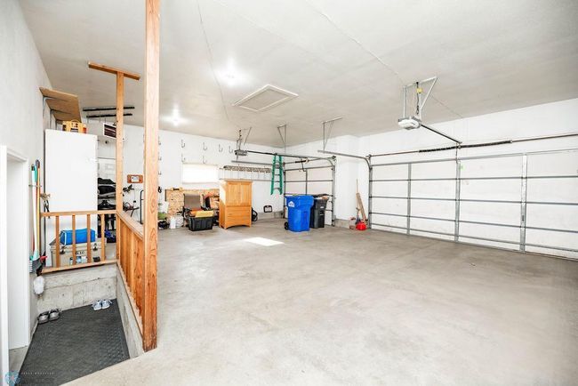 Finished & heated 3 stall garage | Image 54