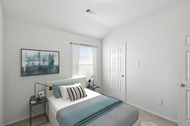 Bedroom featuring baseboards, vaulted ceiling, visible vents, and carpet flooring | Image 15