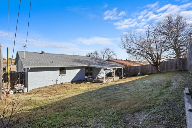 Rear view of property with a lawn | Image 23