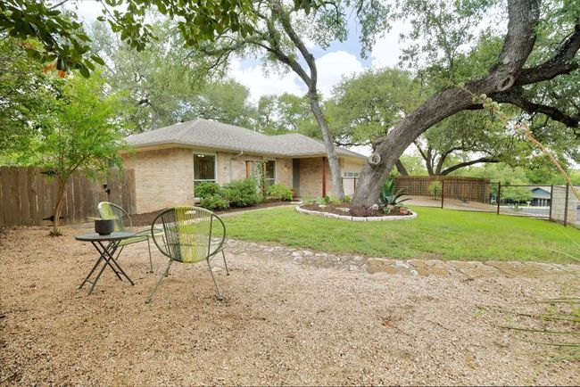 Fully fenced yard extends usable outdoor space | Image 37