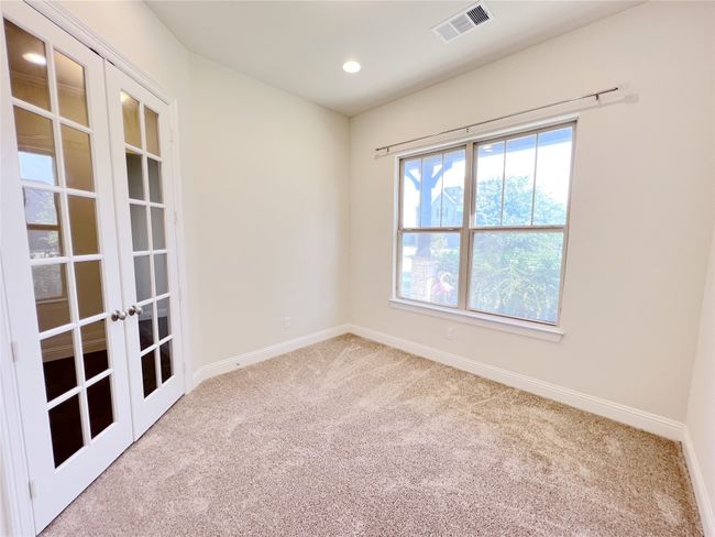 Unfurnished room with french doors, carpet, and recessed lighting | Image 4
