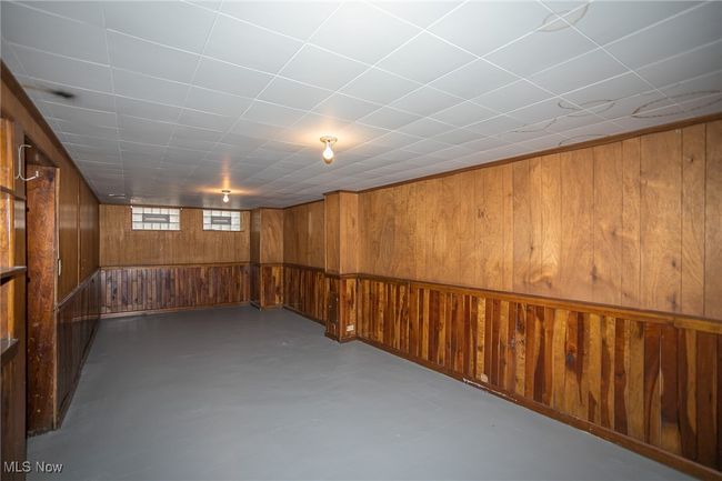 Basement with wooden walls | Image 22