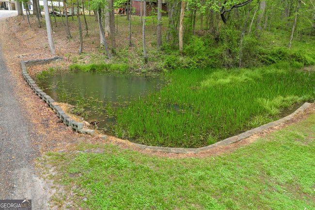 7616 Nicholson Rd, House other with 3 bedrooms, 2 bathrooms and 2 parking in cumming GA | Image 19