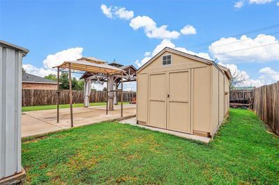 View of outbuilding featuring a lawn and a gazebo | Image 3