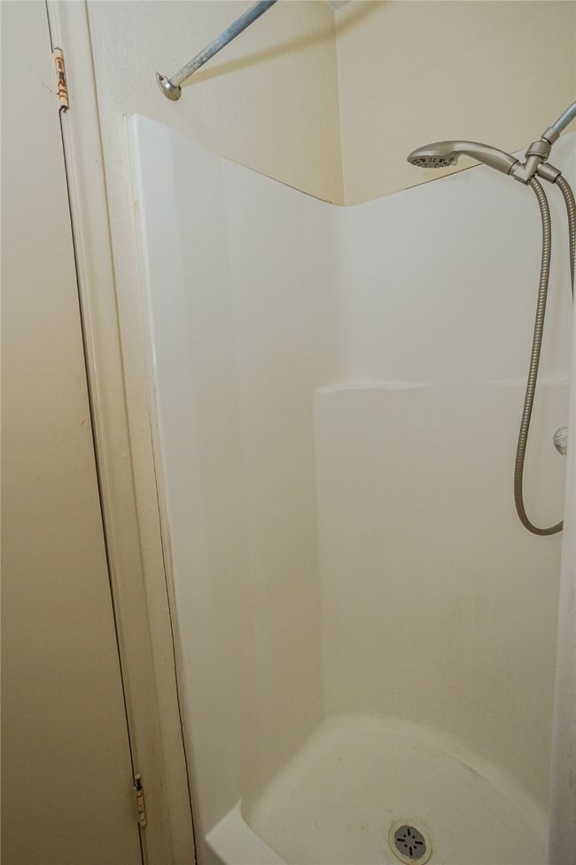 Bathroom 1 featuring a shower | Image 13