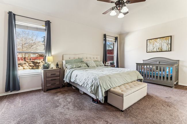 Spacious primary bedroom downstairs | Image 13