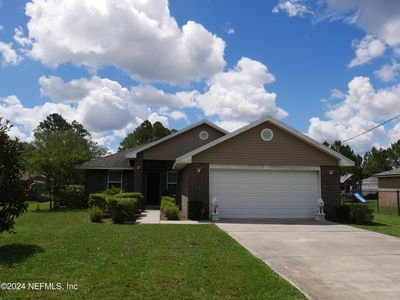 12 Burroughs Drive, House other with 3 bedrooms, 2 bathrooms and null parking in Palm Coast FL | Image 1