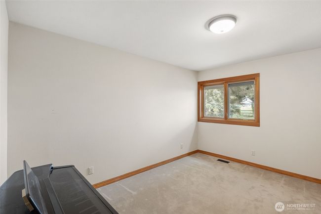 Fourth bedroom with lake views. | Image 24