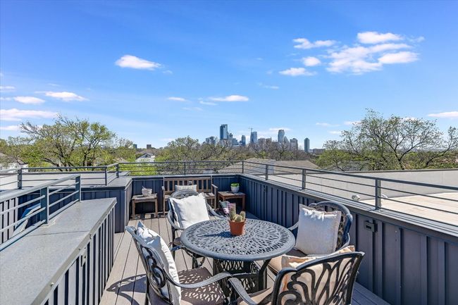 Balcony with a view of city | Image 4