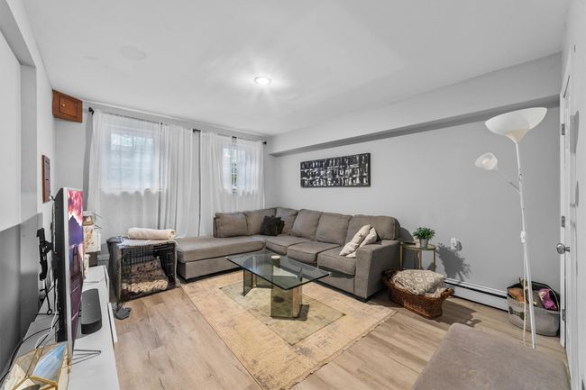 lower level area used as a family room | Image 35