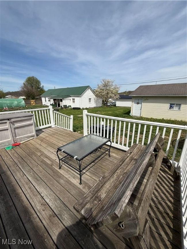 Wooden deck with a lawn | Image 27