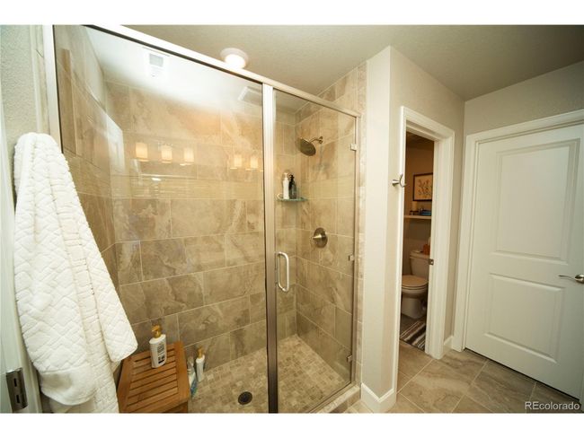 359 Courtfield Way, Townhouse with 3 bedrooms, 3 bathrooms and null parking in Castle Pines CO | Image 21