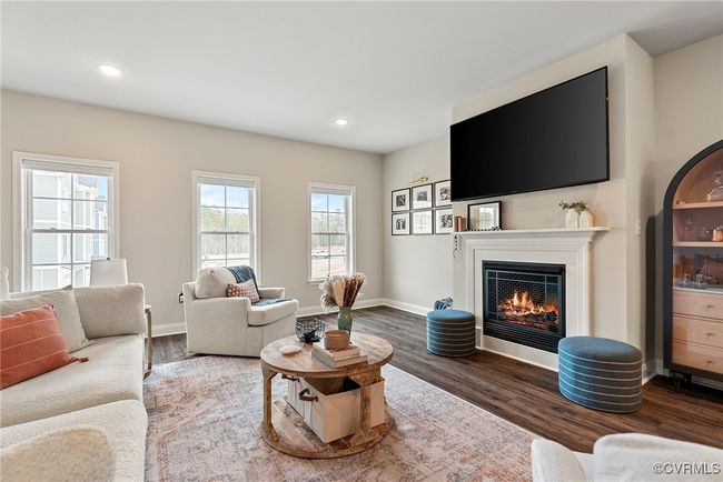 Living room featuring dark hardwood / wood-style flooring | Image 21