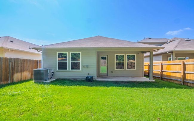 Back of house featuring a patio area and a fenced backyard | Image 23