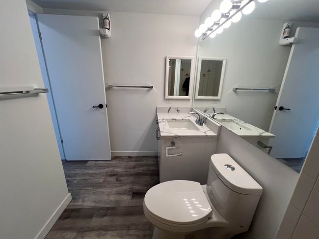 Bathroom featuring vanity and wood finished floors | Image 26