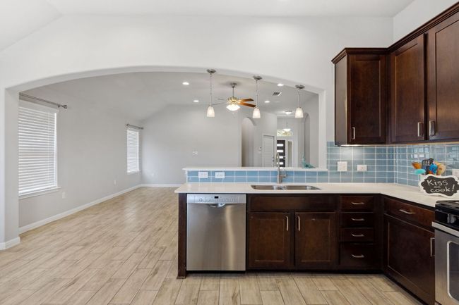 Open concept view from kitchen into the living room | Image 13