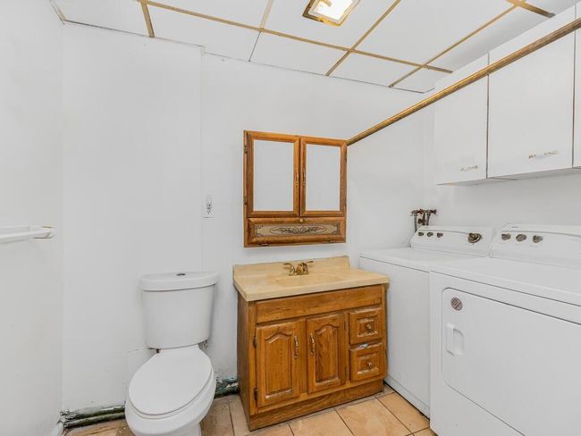 Lower level powder room/laundry | Image 21