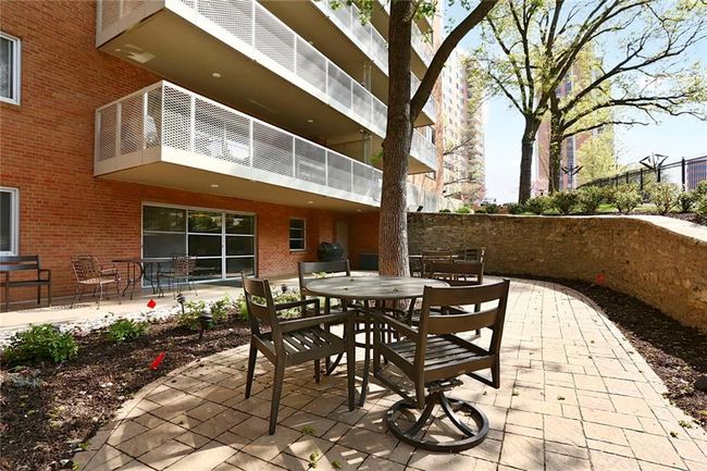 View of patio / terrace featuring outdoor dining area and a balcony | Image 15