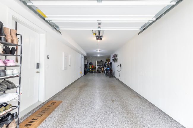 Garage featuring a garage door opener | Image 26