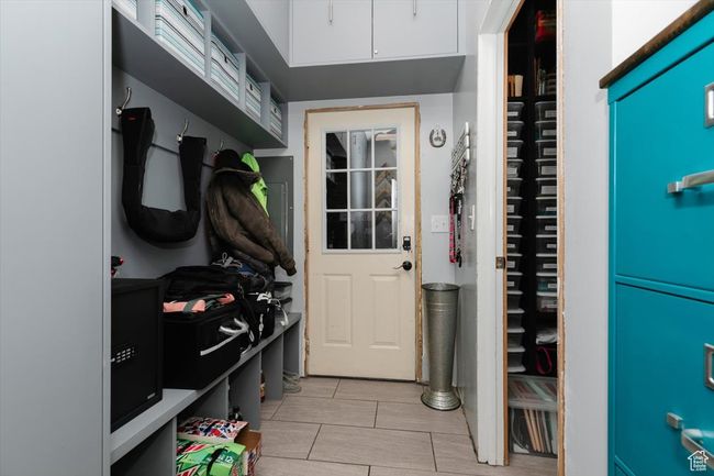 Mudroom with light tile patterned flooring | Image 30