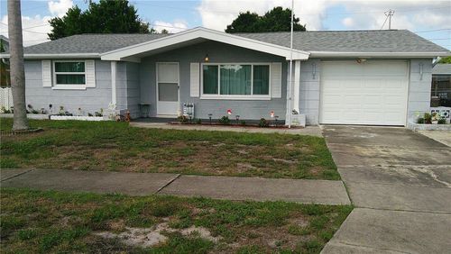 1203 Chancellor Dr, Holiday, FL, 34690-6418 | Card Image