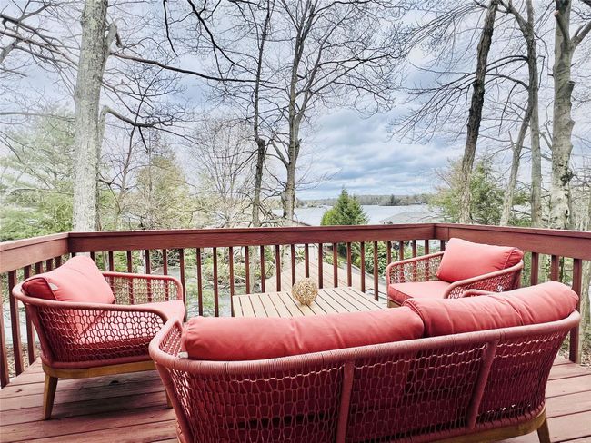 Wooden deck featuring a water view | Image 11