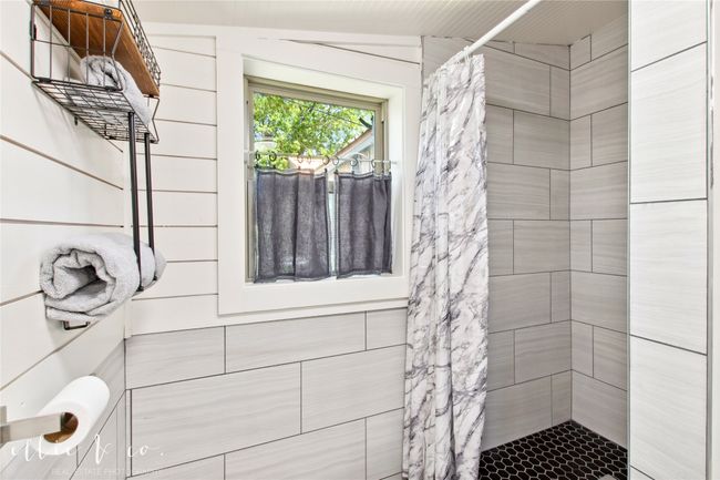 Mainbathroom with a tile shower | Image 24