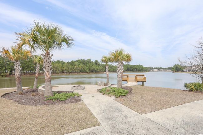 Exterior space with a water view and an outdoor fire pit | Image 33