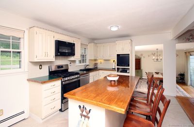 Spacious Eat-In Kitchen with Custom Island | Image 3